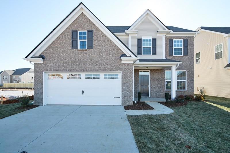(Pic of Similar model) Gorgeous brick and hardiy accents 