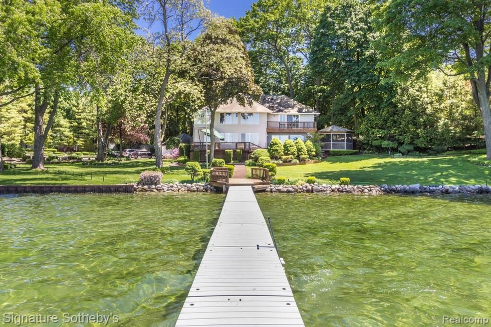 Beautifully landscaped grounds with a natural ston