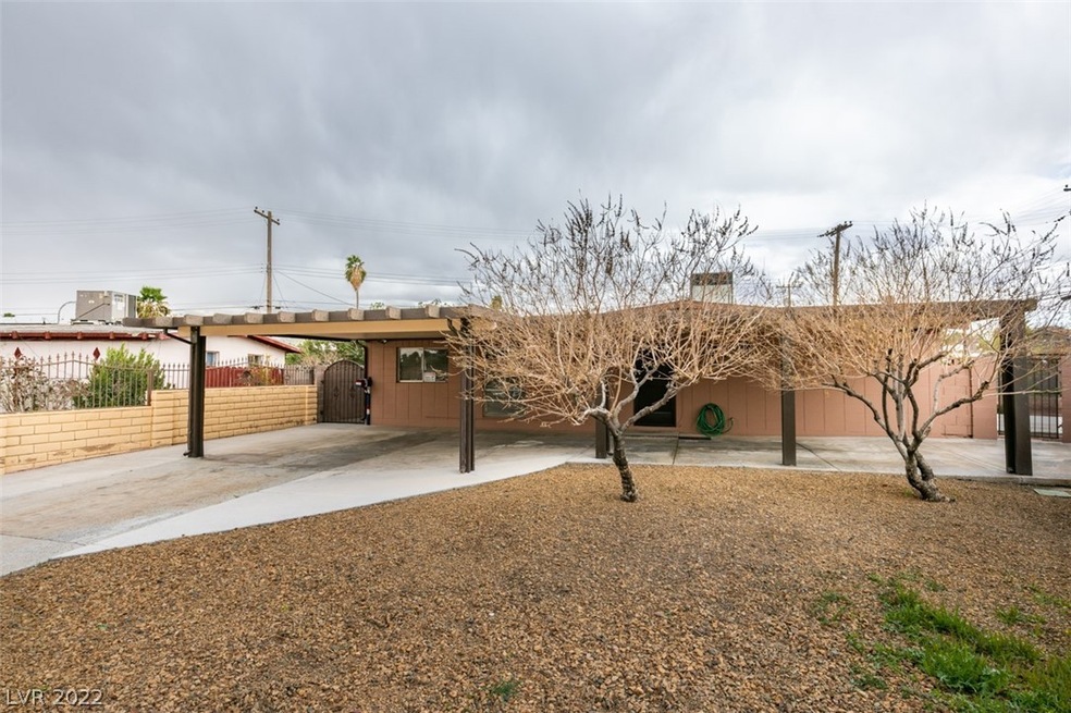 Front yard with carport and 2 separate patio cover