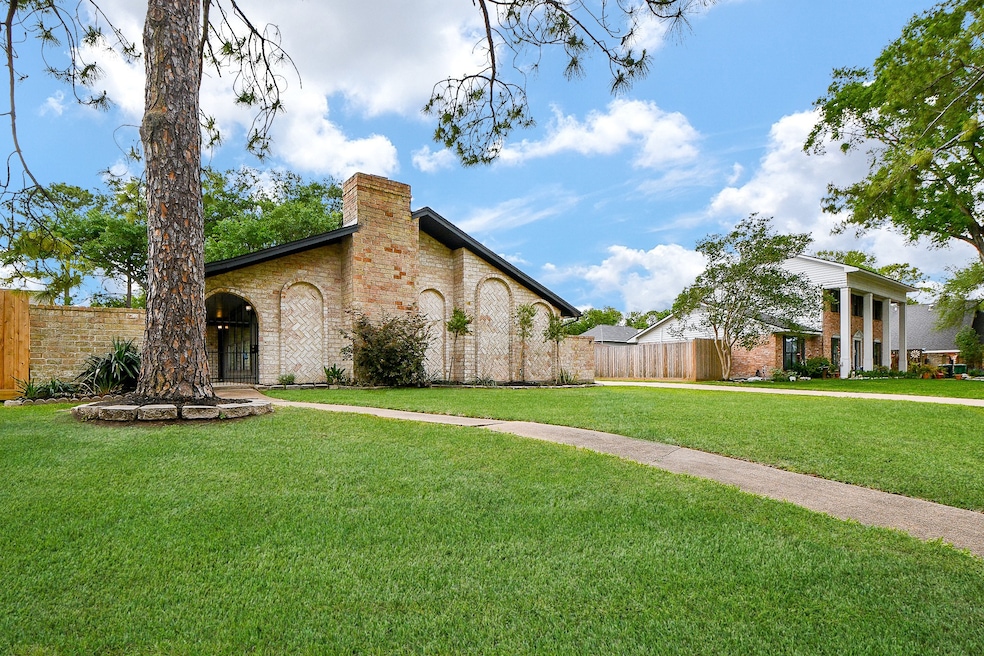 Charming single-story brick home with unique arche