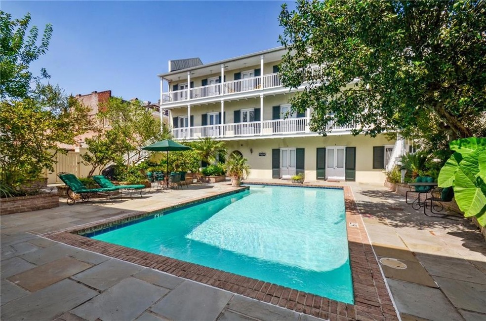 Courtyard /  Pool. Front door second level, left s