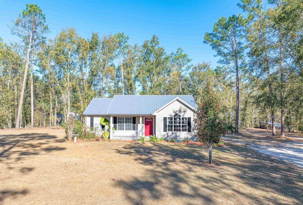 285 NE Green Tree Terrace, Lee, FL 32059 - photo 1