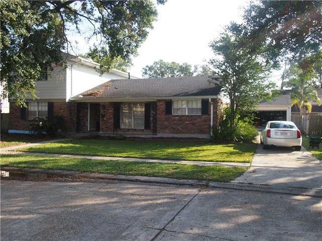Photo. Nice curb appeal, and rear yard access lead