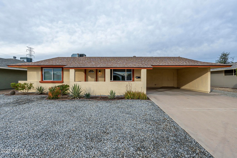 Remodeled home with carport