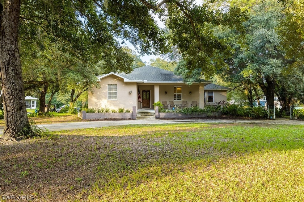 1812 Mcarthur Ave, Lehigh Acres, FL 33972 - photo 1