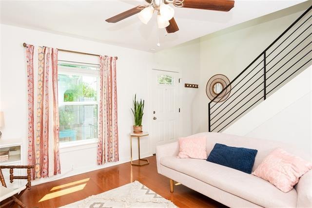 Open metal staircase to bedrooms up.