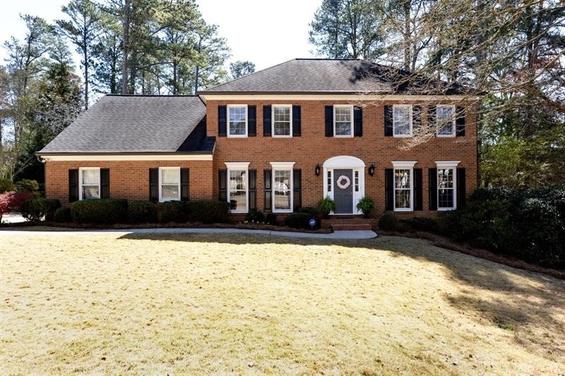 TRADITIONAL BRICK HOME WITH UPGRADES GALORE