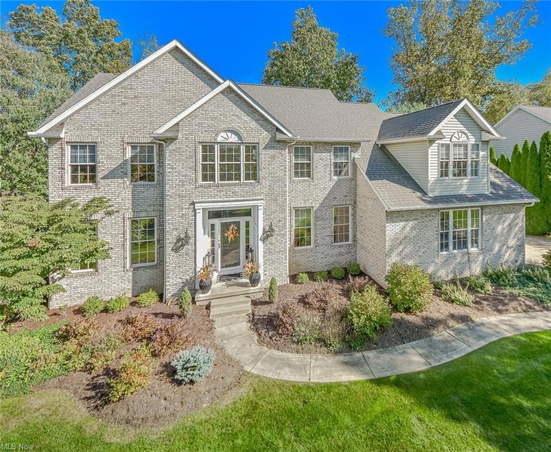 Extraordinary curb appeal with this custom built h