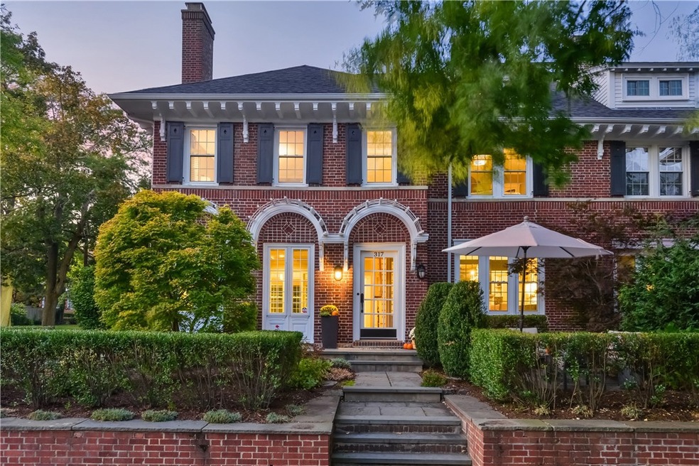 Front Entry with patio and garden. Corner of Wayla