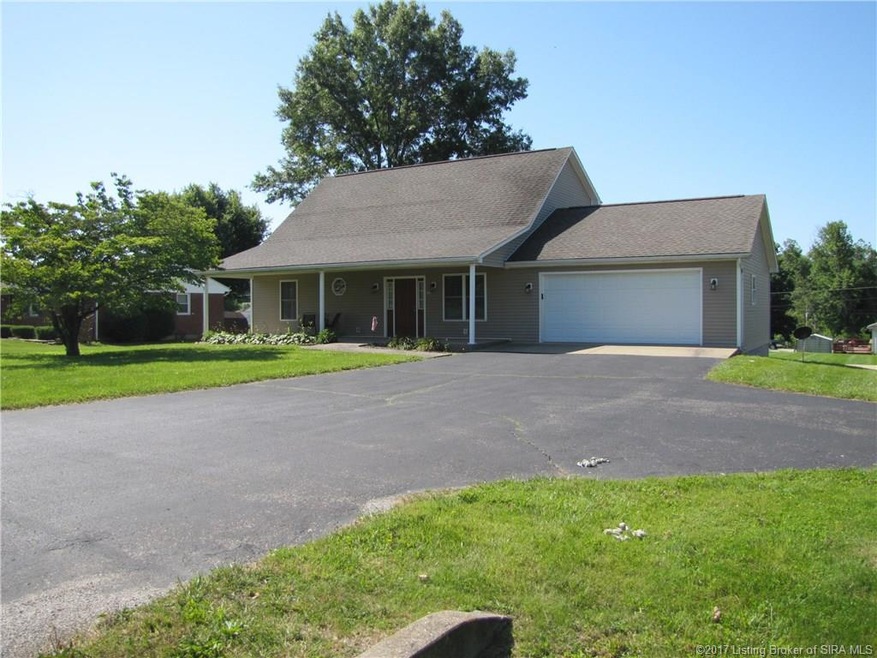 Front view of home, large yard with plenty of park