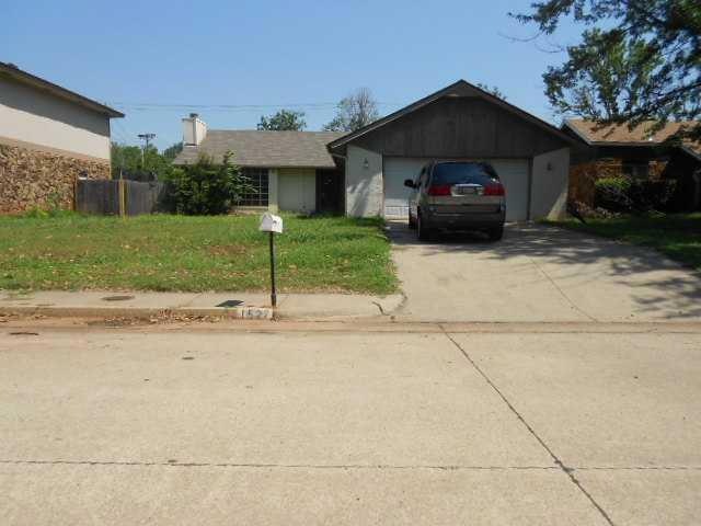 Exterior Front. Two car garage and drive.