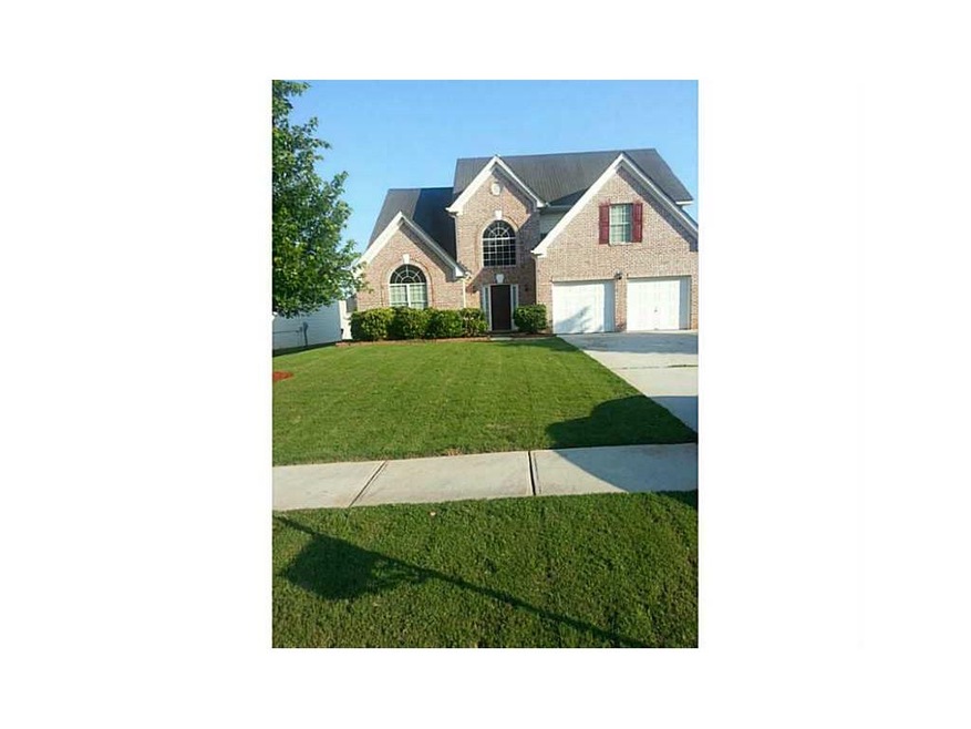 Exterior Front. Two story, brick front home in a s