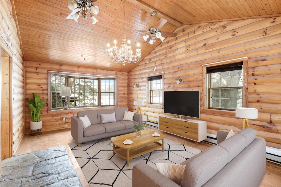 Beautiful log addition with virtual staging!