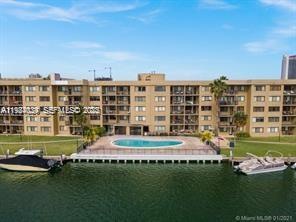301 Golden Isles Dr unit 111, Hallandale Beach, FL 33009 - photo 1