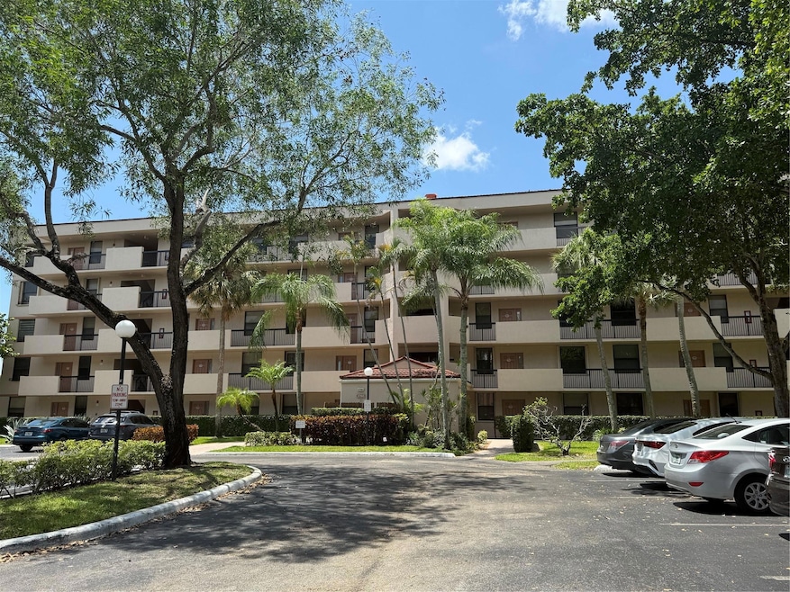 2768 Carambola Cir S unit 206, Coconut Creek, FL 33066 - photo 1