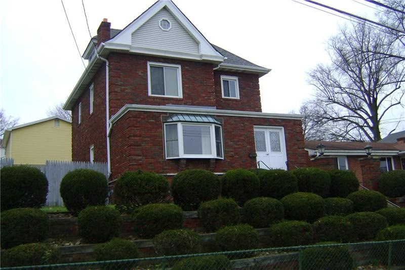 SOLID BRICK SPACIOUS HOME. BAY WINDOW, NEWER ROOF,
