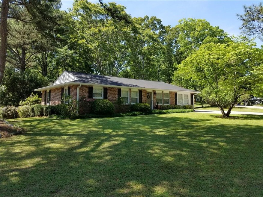 Nice corner lot in lovely setting, walk down stree