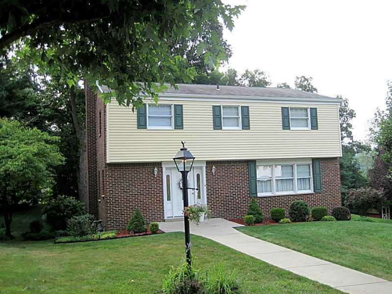 Exterior Front. Well maintained 4-bedroom-level en