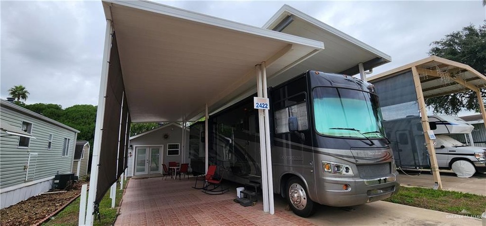 View of car parking with a carport