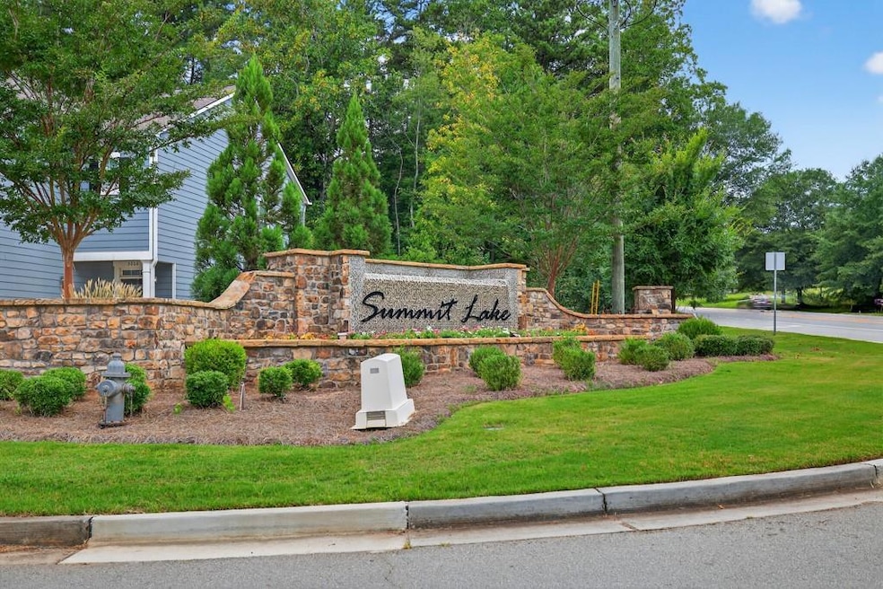 Community sign with a lawn