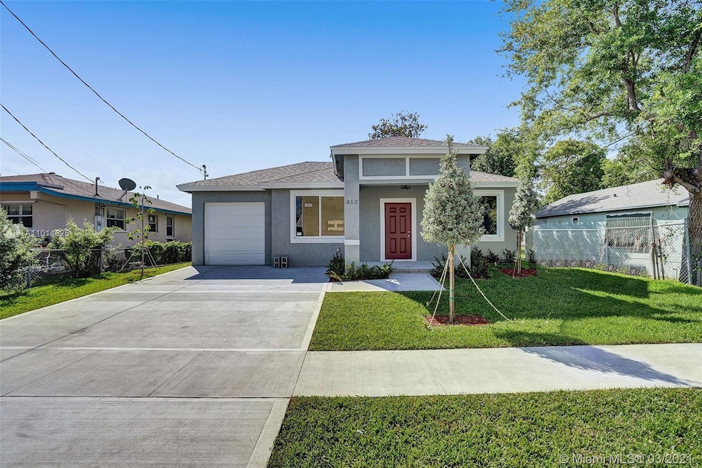 812 Phippen Waiters Rd, Dania, FL 33004 - photo 1