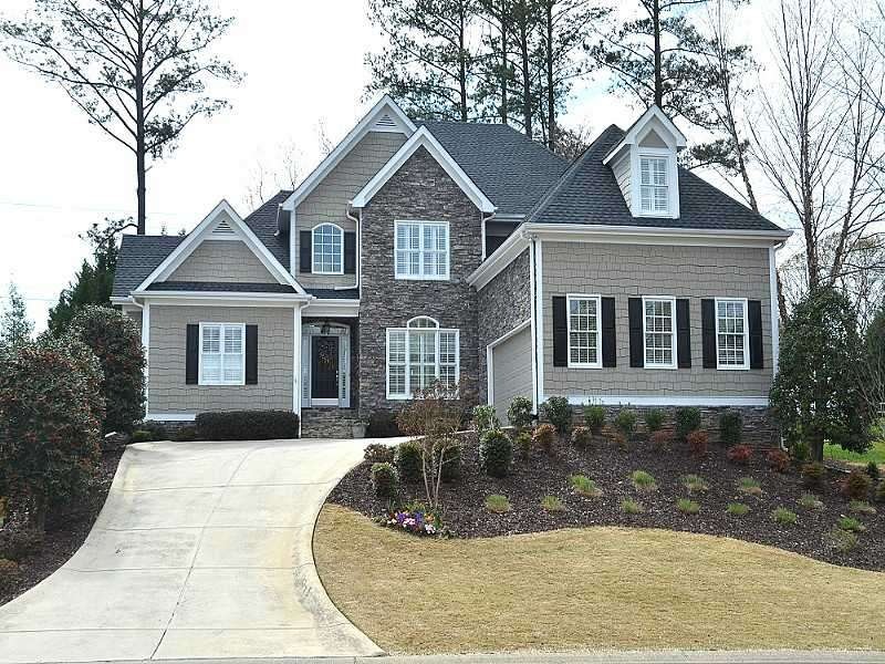 Exterior Front. Custom Built Stone/HardiPlank Home