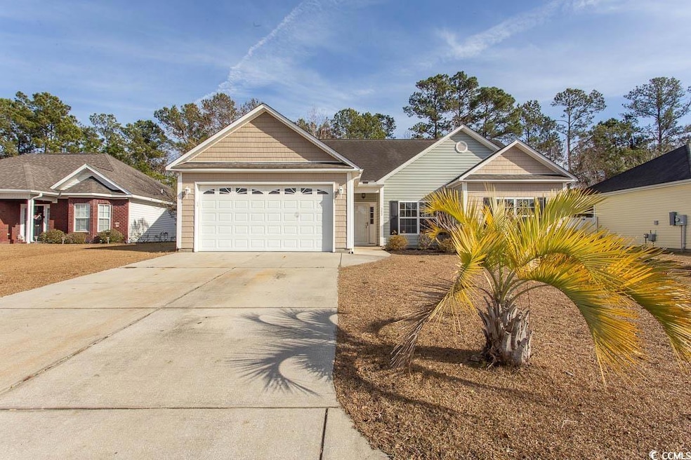 Single story home featuring a garage