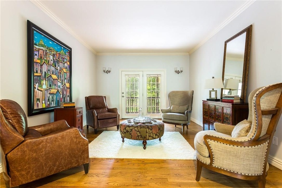 Great Conversation Room with access to the Screened in Deck, Bright and Beautiful Formal Area if needed