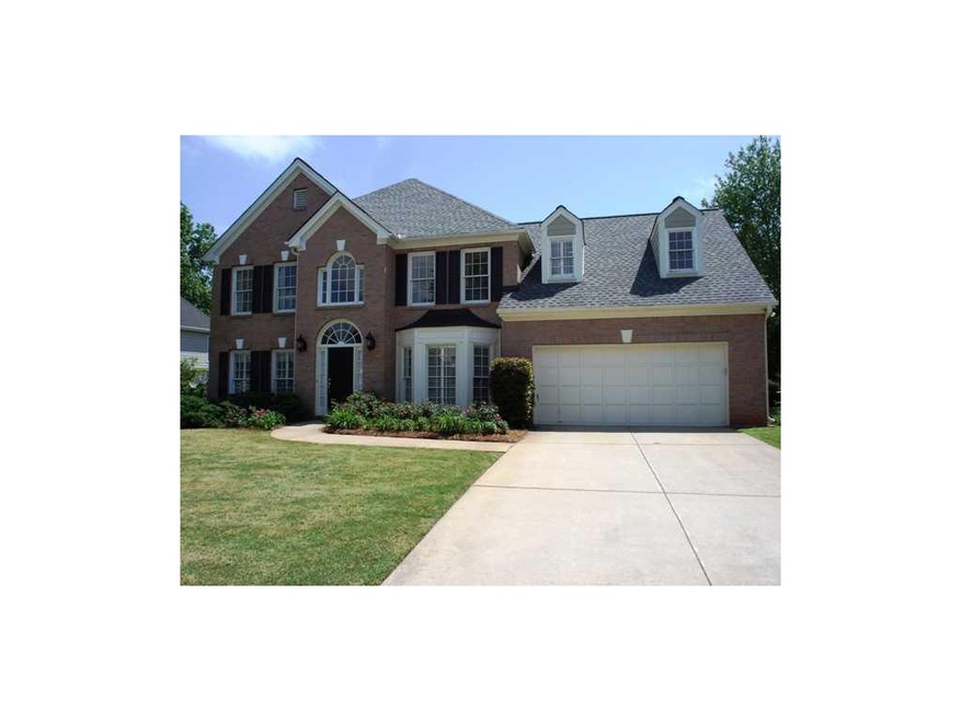 Exterior Front. Lush lawn and landscaping, newer H