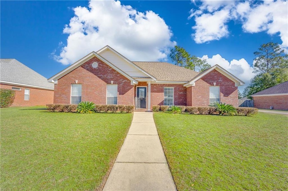 View of front of home featuring a front lawn