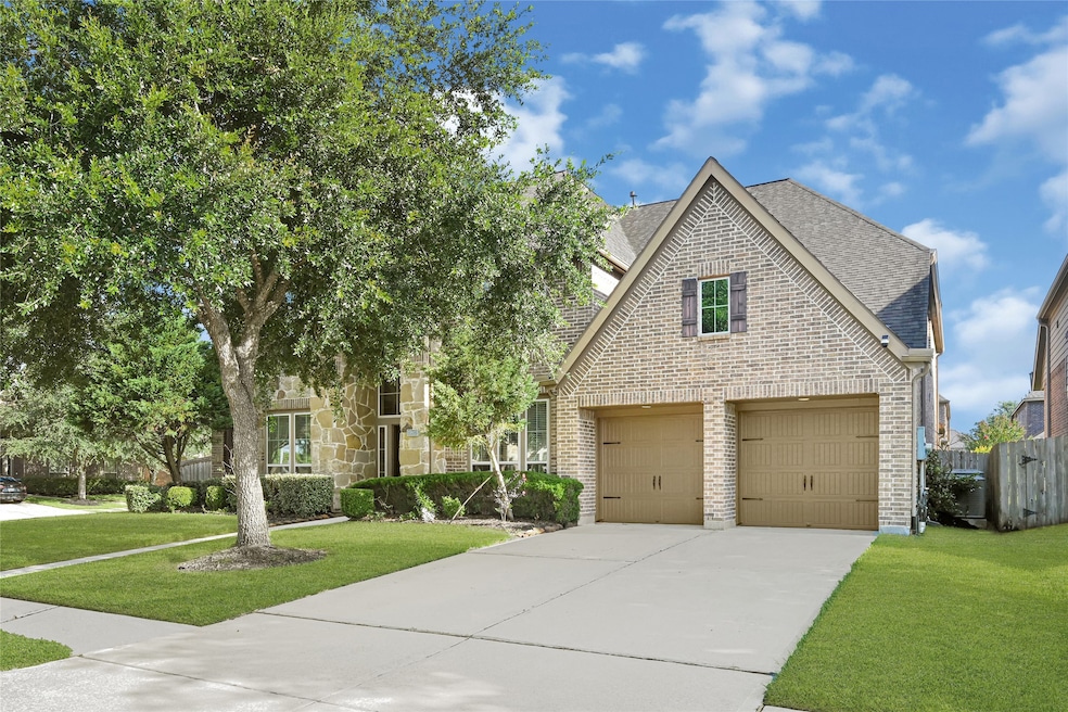 Eye-catching rooflines and a lovely brick exterior