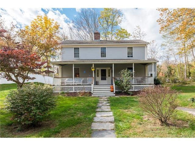 Front of home with nice long porch for relaxing.