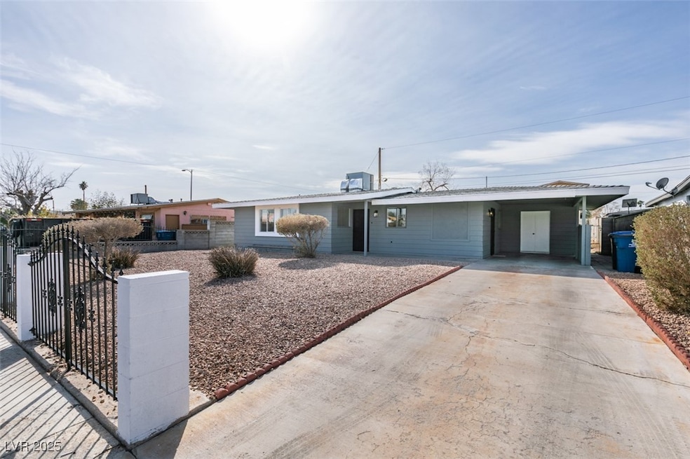 Ranch-style home with central AC, a fenced front y