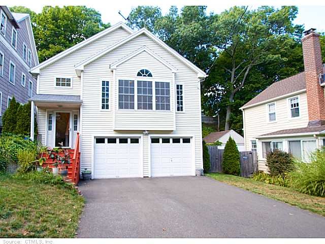 Exterior Front. 2-car garage, plenty of parking!
