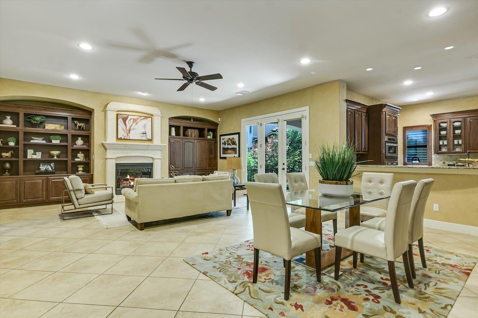 Dining area with light tile patterned flooring, r