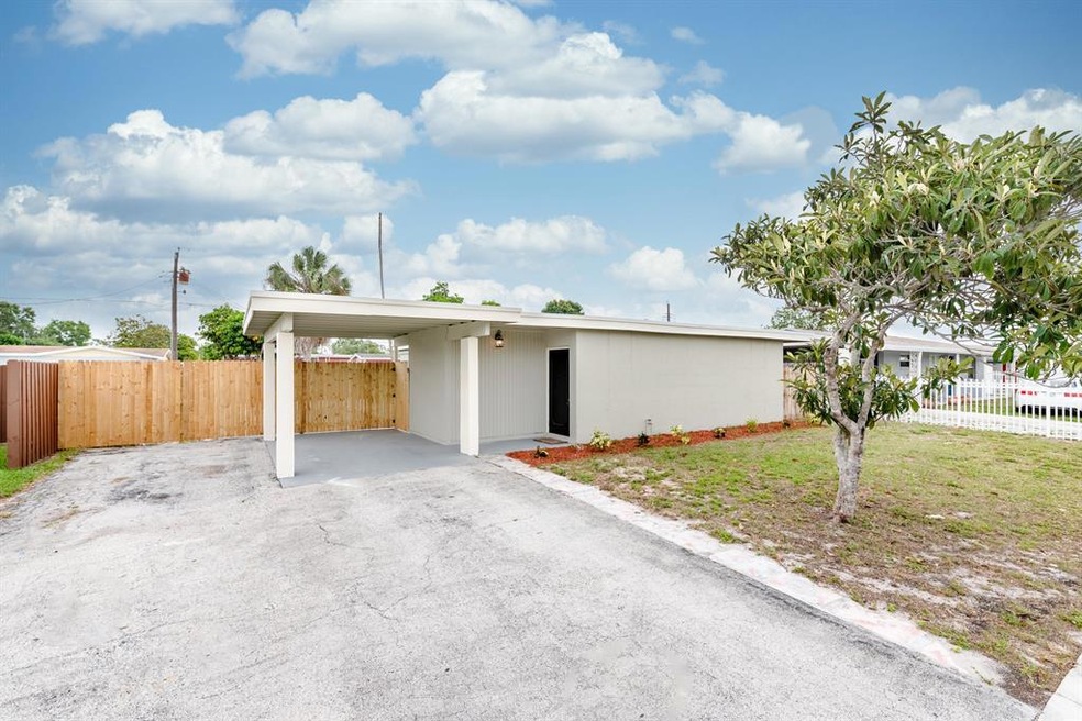 5843 Purdy Ln, West Palm Beach, FL 33415 - photo 1