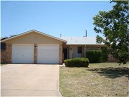 Front view with two car garage