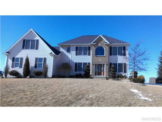 Exterior Front Great Curb Appeal Located up on a H