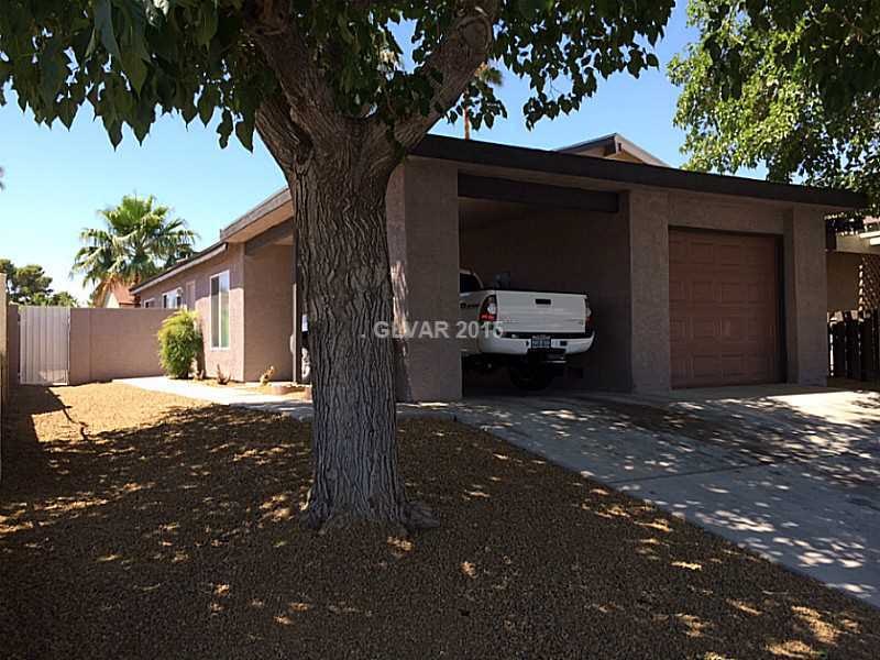 Facade/Exterior Front. ONE CAR GARAGE PLUS ATTACHE