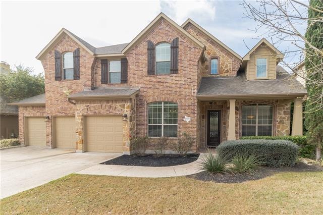 Beautiful Drees custom home with stone and brick a