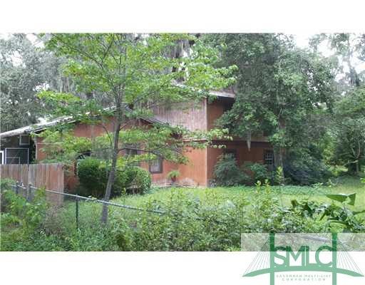 Exterior Front. Split level cedar home