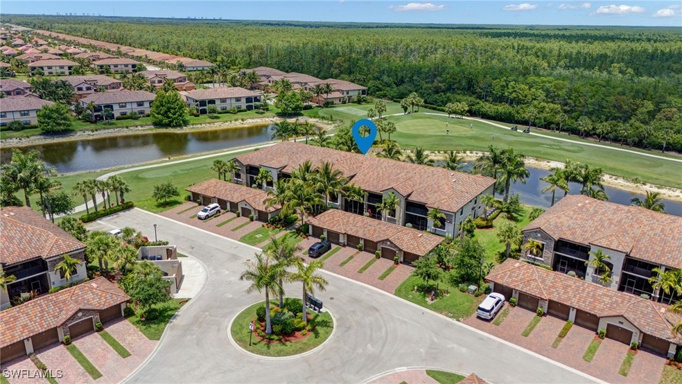Aerial view of residential area featuring a forest