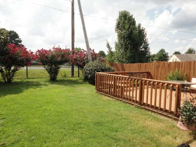 Property back up to tennis court.