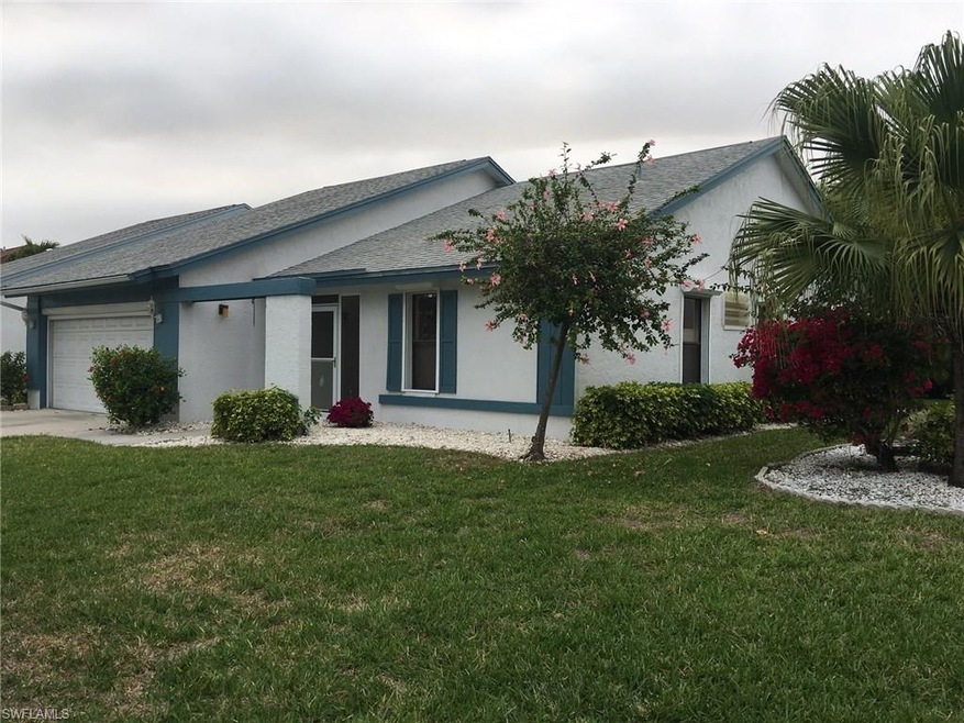 FRONT VIEW OF THIS LOVELY HOME WITH NICE LANDSCAPING