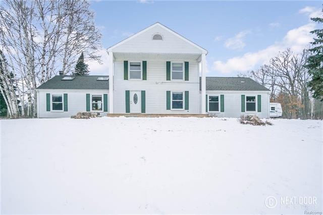Colonial Home on 21 Acres!