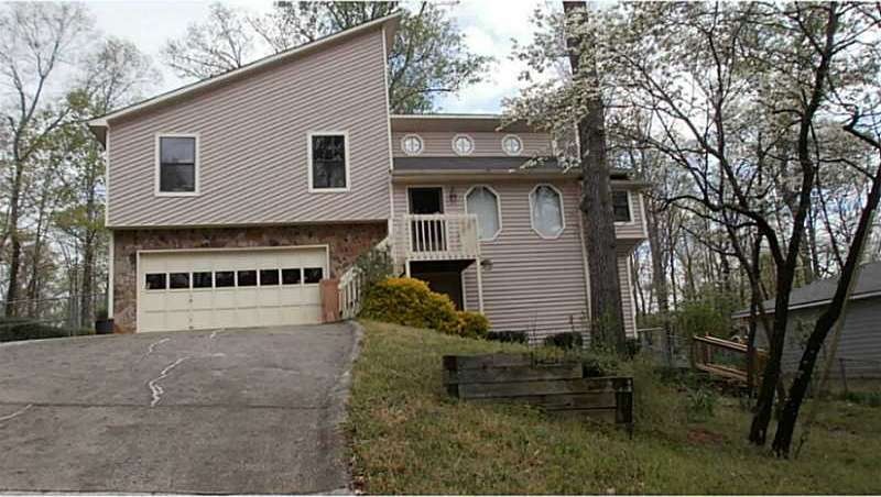 Exterior Front. driveway goes up and  then levels 