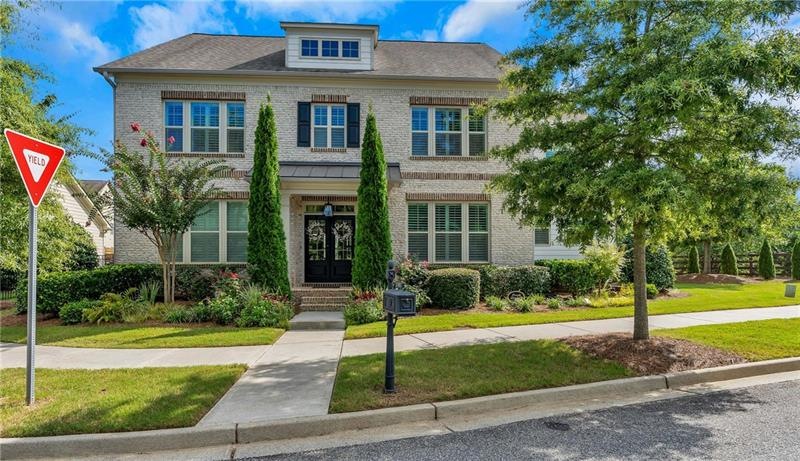 Gorgeous brick elevation with double front doors a