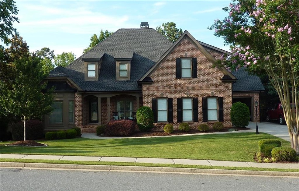 Gorgeous home on golf course lot with master on ma