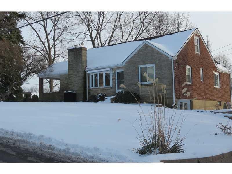 Exterior Front. Brick and Stone Exterior.  Large c