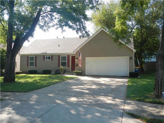 Sassy Chic 1.5 story home with 2 car garage.  All 